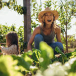 Beautiful,Young,Female,Farmer,Working,In,Her,Garden,With,Her