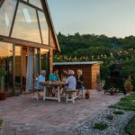 Three,Generation,Family,Having,A,Garden,Party,In,The,Summer.